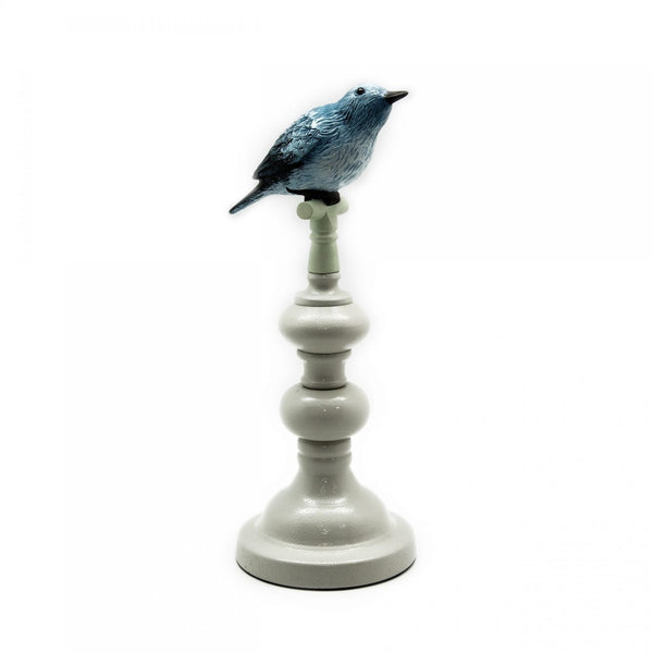 Solitary Blue Bird on Ceramic Sculpture