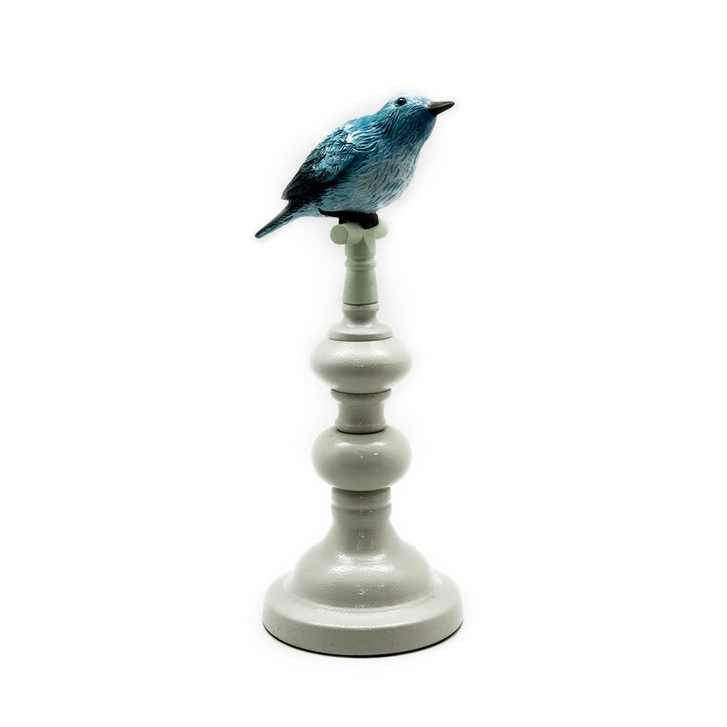 Solitary Blue Bird on Ceramic Sculpture